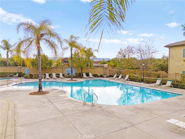 view of pool featuring a patio area