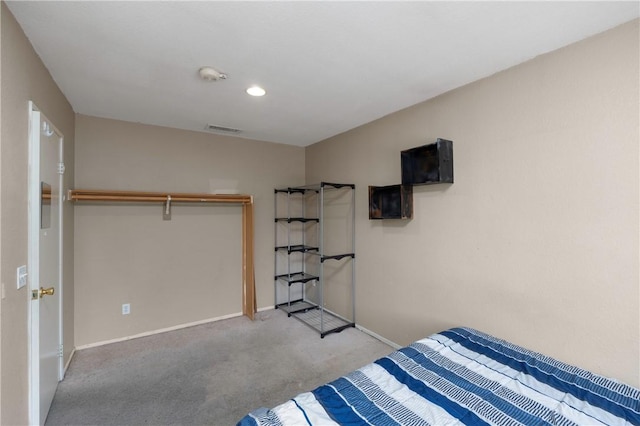 unfurnished bedroom with light colored carpet