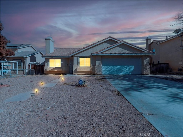 view of front of home featuring a garage