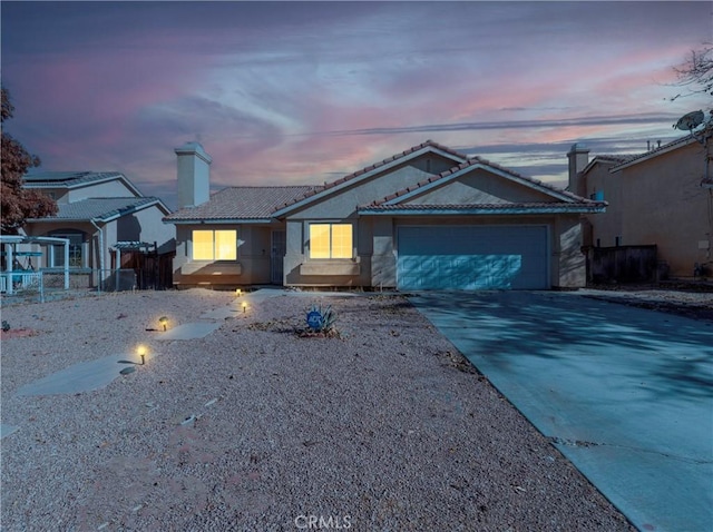 view of front of property featuring a garage