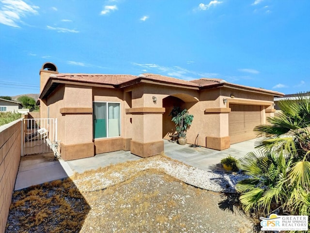 view of front of property featuring a garage