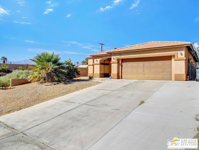 single story home with a garage