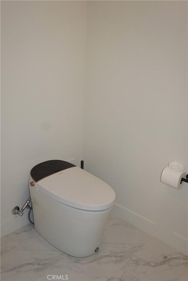 bathroom featuring toilet