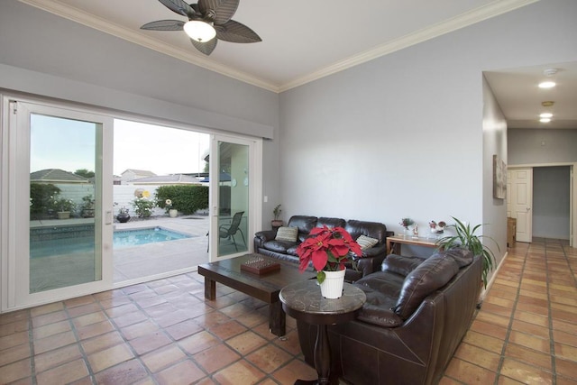 living room featuring tile patterned flooring, crown molding, and ceiling fan