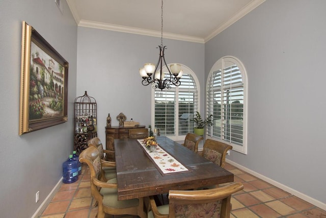 dining room with crown molding, an inviting chandelier, and tile patterned flooring