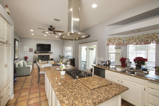 kitchen with white cabinetry, island range hood, dishwashing machine, a kitchen island, and stainless steel gas stovetop