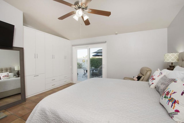 bedroom featuring access to exterior, light tile patterned floors, vaulted ceiling, and ceiling fan