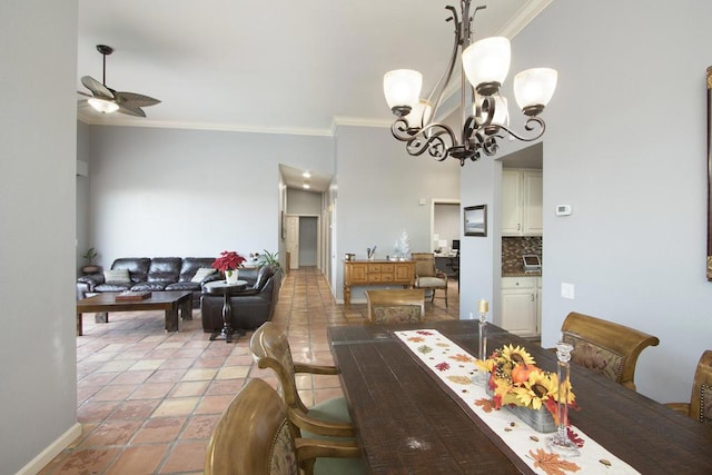 tiled dining area featuring ceiling fan with notable chandelier and ornamental molding