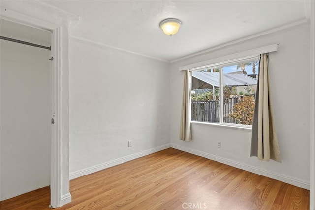 unfurnished room featuring light hardwood / wood-style flooring