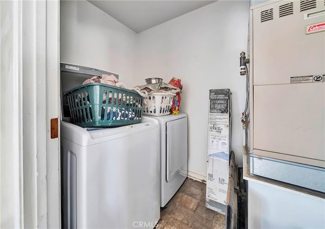 washroom with washing machine and dryer