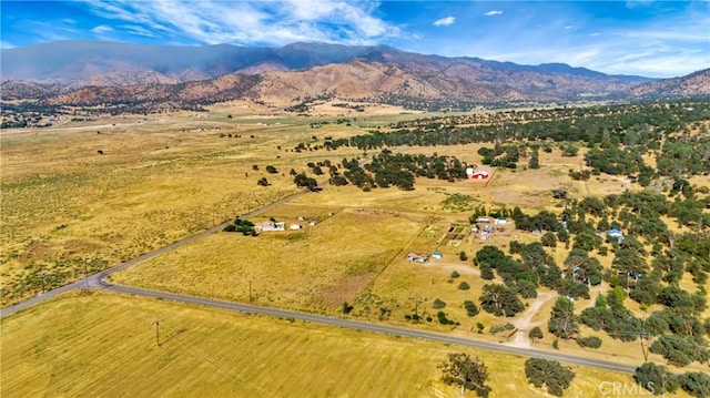 bird's eye view featuring a mountain view and a rural view