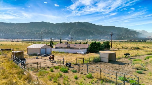 view of mountain feature with a rural view