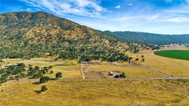 mountain view featuring a rural view