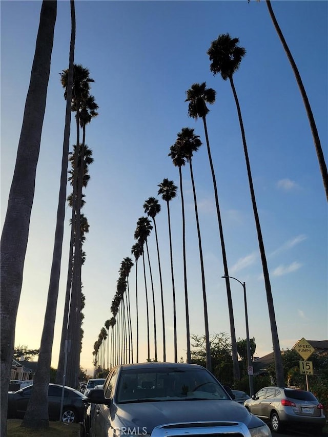 view of parking at dusk