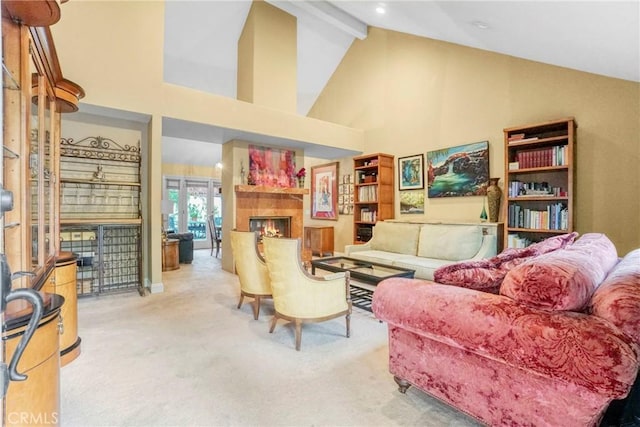 carpeted living room with beamed ceiling and high vaulted ceiling