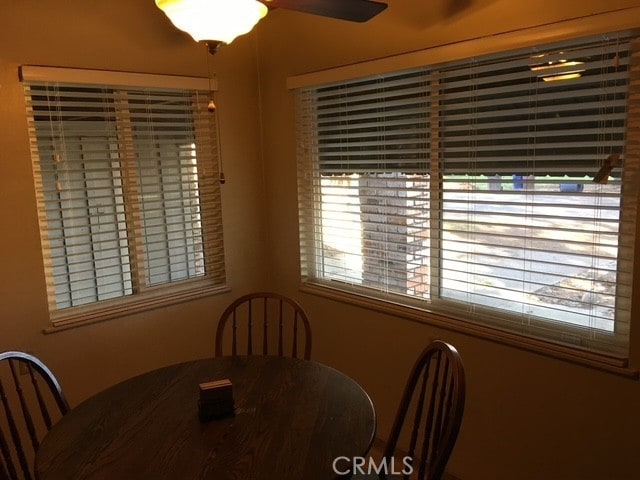 dining room with ceiling fan