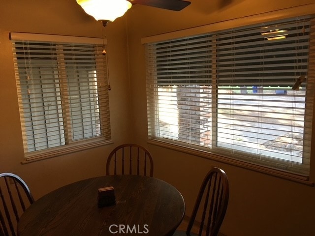 dining room with a ceiling fan