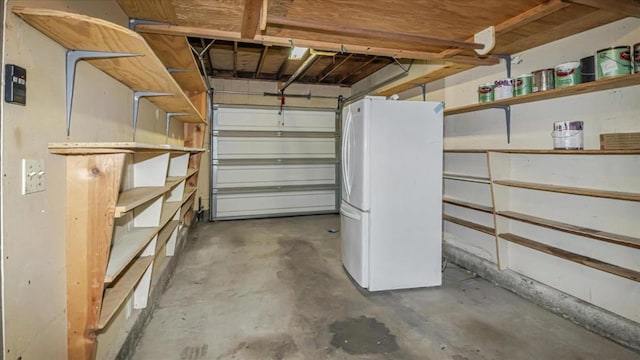 garage with white refrigerator