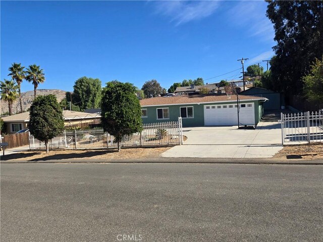 single story home with a garage