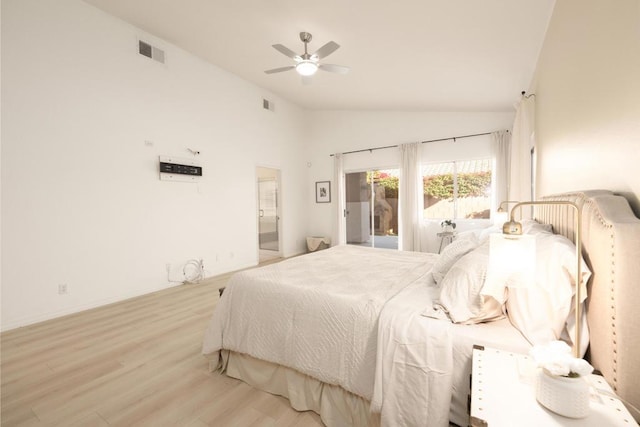 bedroom featuring access to exterior, light hardwood / wood-style flooring, ceiling fan, and lofted ceiling