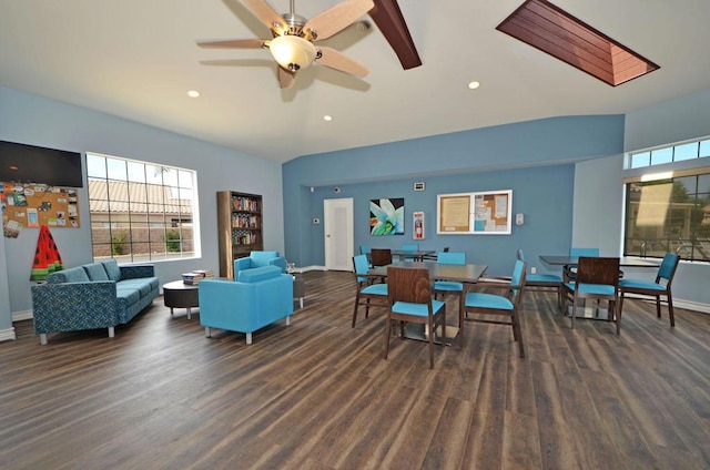 living room with dark hardwood / wood-style flooring and ceiling fan