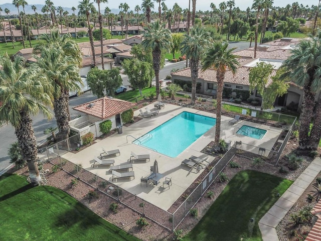 view of swimming pool with a patio area