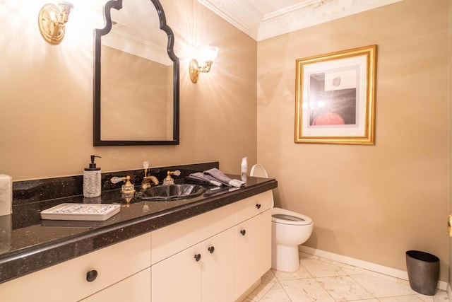 bathroom featuring crown molding, vanity, and toilet