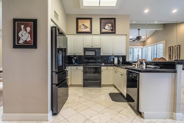 kitchen featuring black appliances, lofted ceiling with beams, kitchen peninsula, ceiling fan, and backsplash