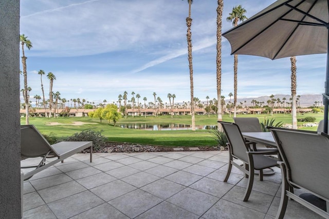 view of patio / terrace with a water view