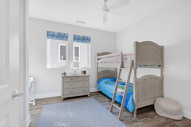 bedroom featuring ceiling fan and wood-type flooring