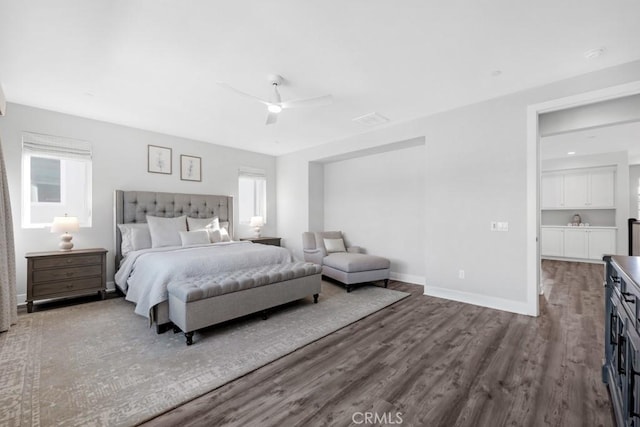 bedroom with ceiling fan and wood-type flooring