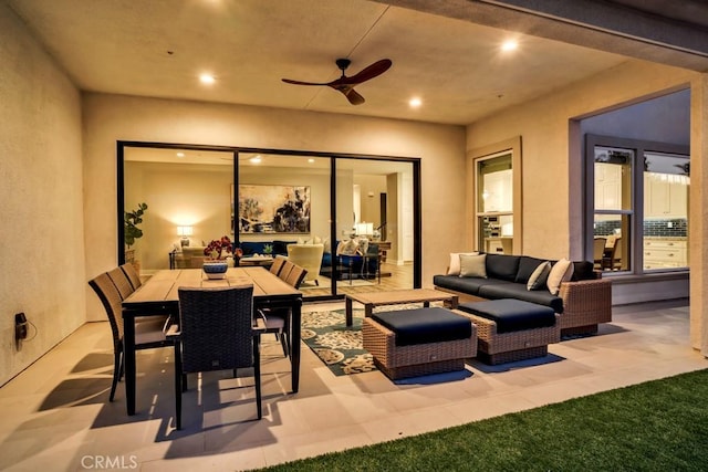 view of patio / terrace featuring ceiling fan and outdoor lounge area