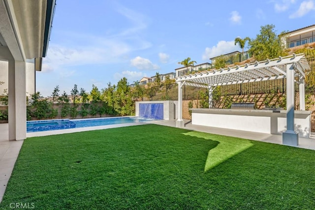 view of yard with pool water feature, a pergola, and a fenced in pool