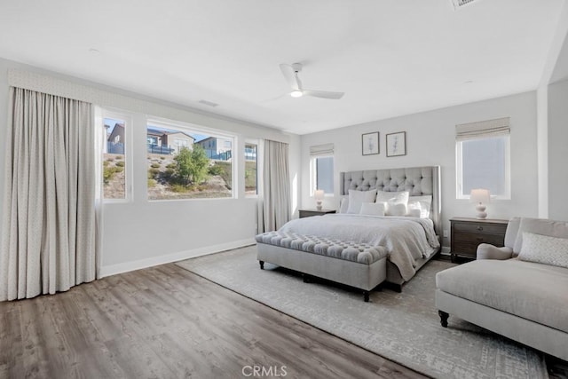 bedroom featuring ceiling fan and wood-type flooring