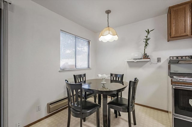 dining area featuring a baseboard radiator