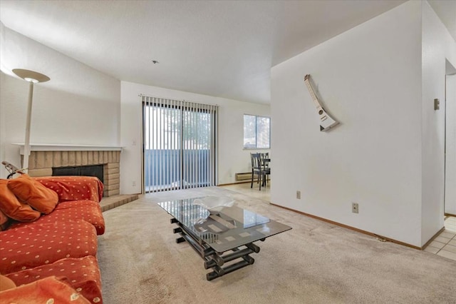 carpeted living room with a fireplace