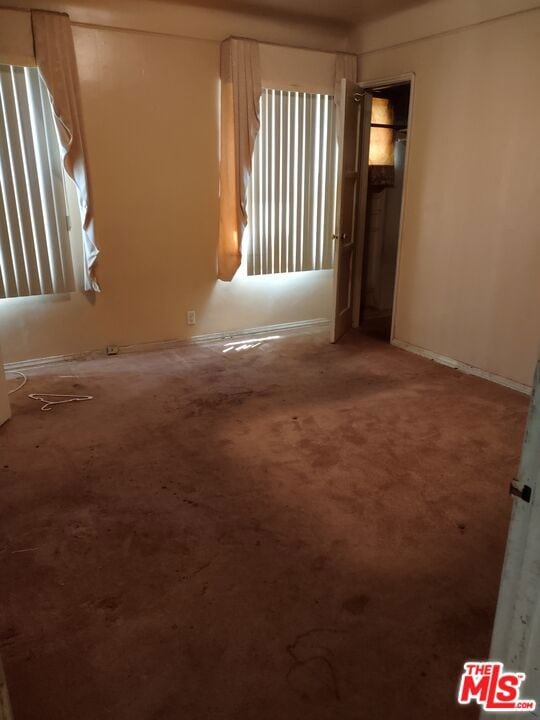 empty room featuring carpet flooring