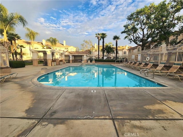 912 N Turner Ave Unit 58, Ontario, CA 91764 - pool featuring a patio and fence