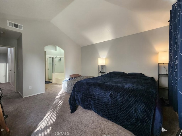 912 N Turner Ave Unit 58, Ontario, CA 91764 - bedroom featuring carpet flooring, visible vents, arched walkways, ensuite bath, and vaulted ceiling