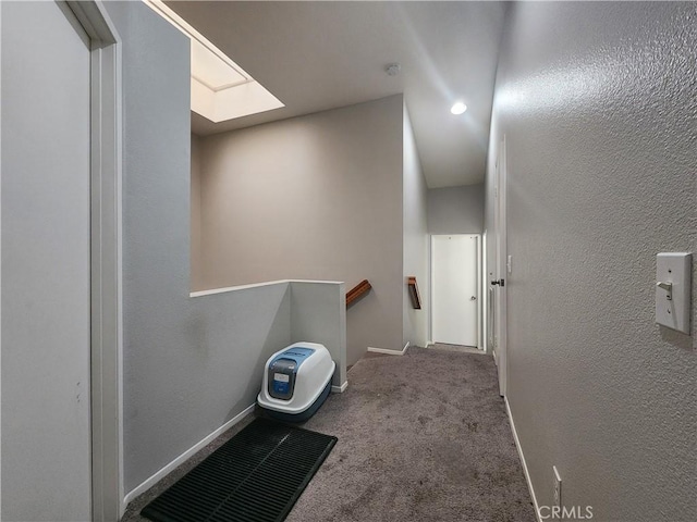 912 N Turner Ave Unit 58, Ontario, CA 91764 - hallway with carpet flooring, a textured wall, an upstairs landing, and baseboards