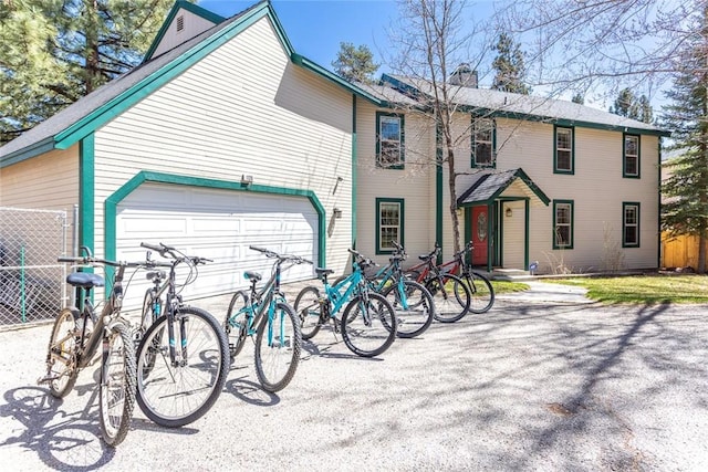 exterior space with a garage