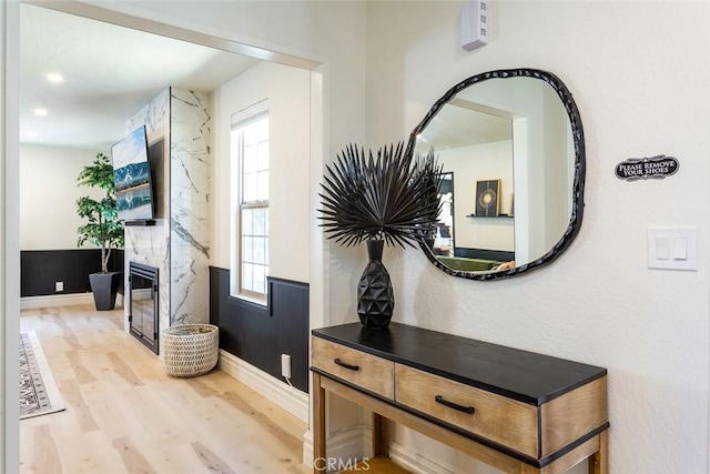 interior space featuring a healthy amount of sunlight and light hardwood / wood-style flooring