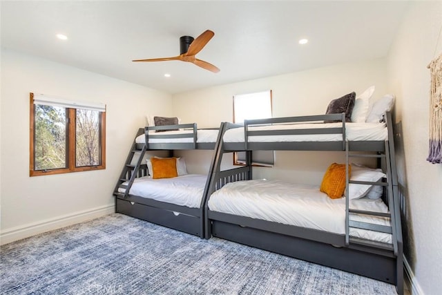 bedroom featuring carpet flooring and ceiling fan