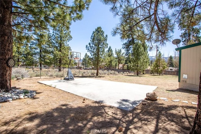 view of patio with basketball court