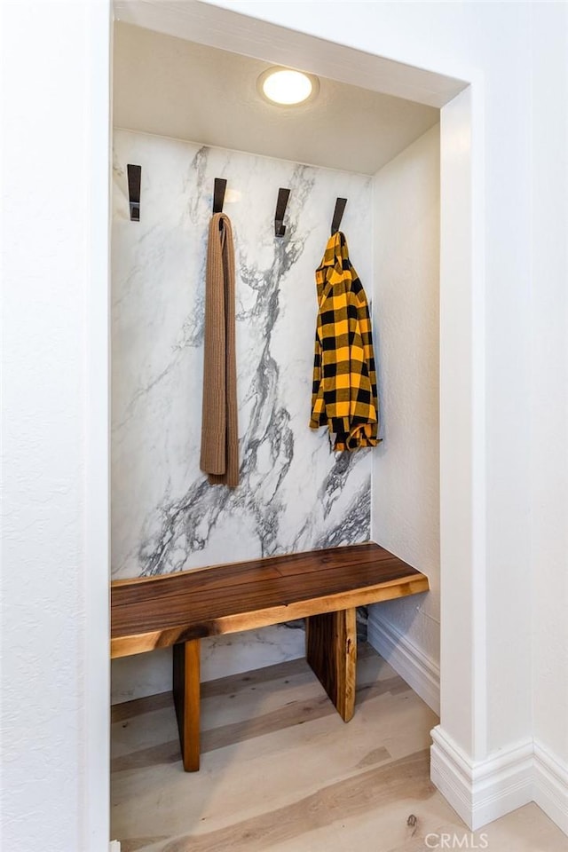 mudroom with hardwood / wood-style floors