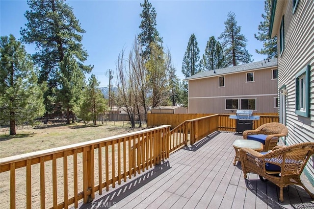 deck featuring a lawn