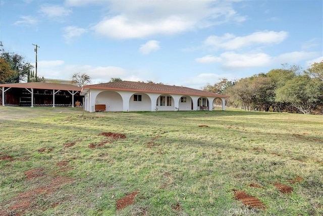 exterior space featuring a yard