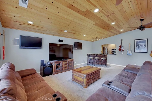 living room featuring lofted ceiling, recessed lighting, carpet flooring, wooden ceiling, and baseboards