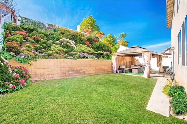 view of yard with a gazebo, a patio area, and outdoor lounge area