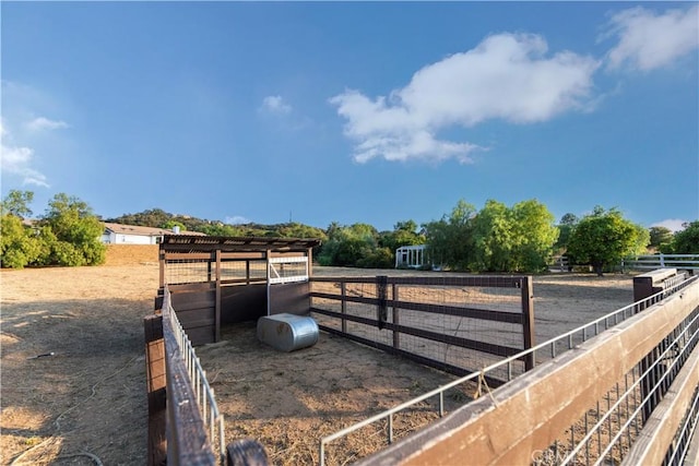 exterior space with a rural view